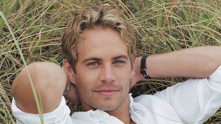 Paul Walker Laying On Grass In White Shirt Photoshoot